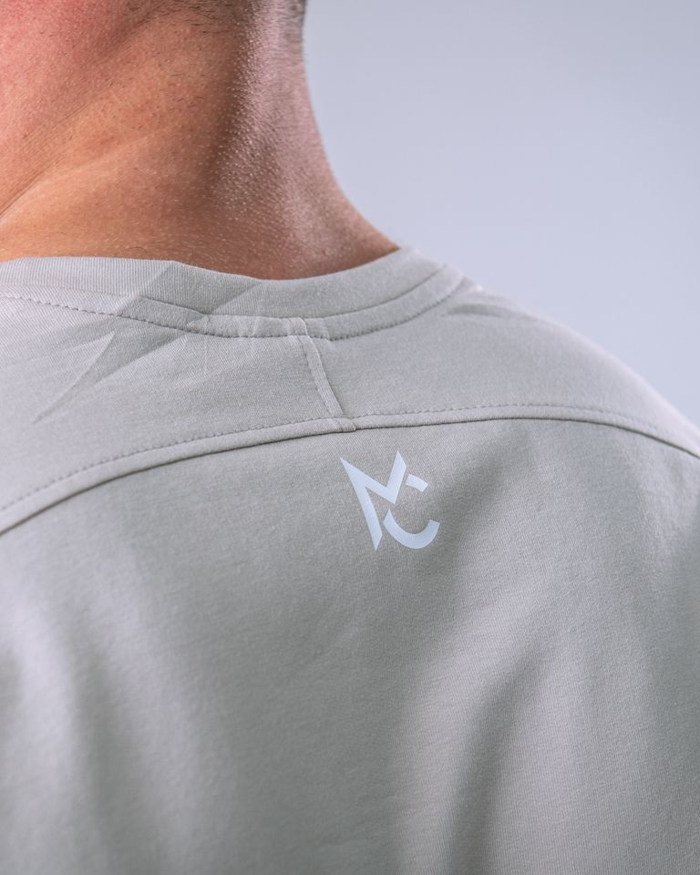 Pánské tričko oversize s malým potiskem béžové M-4