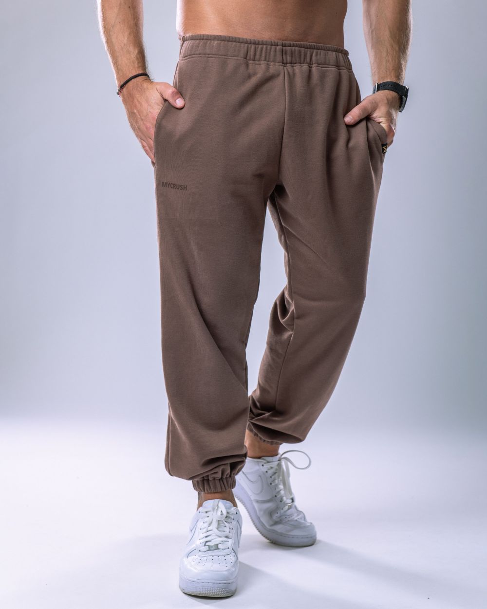 Unisex tepláky regular hnědé L